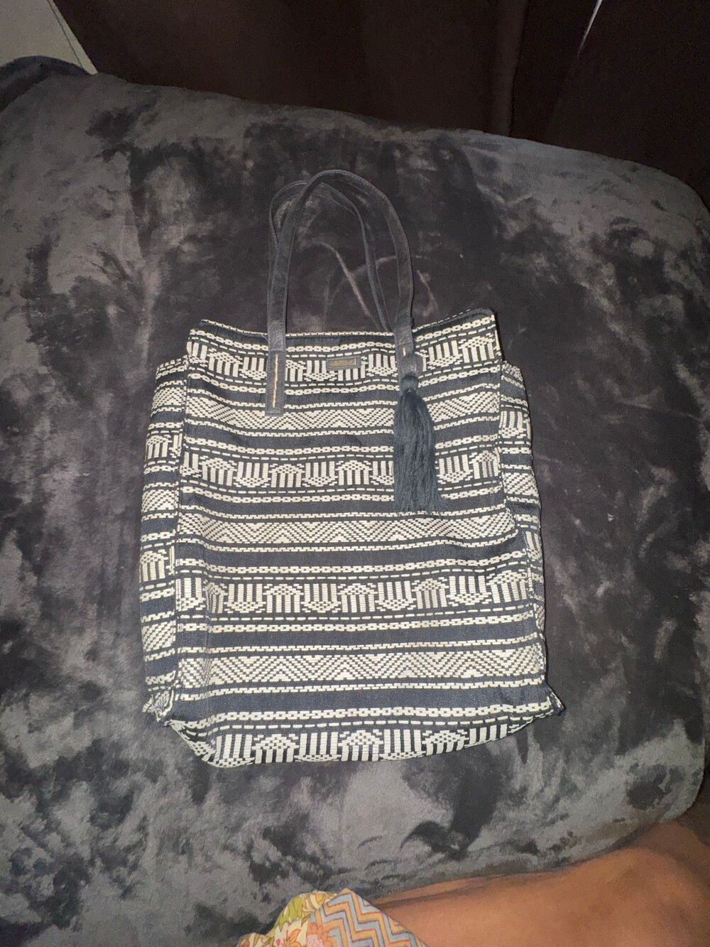 Black and White Tote Bag with Leather Handles and Tassel Detail